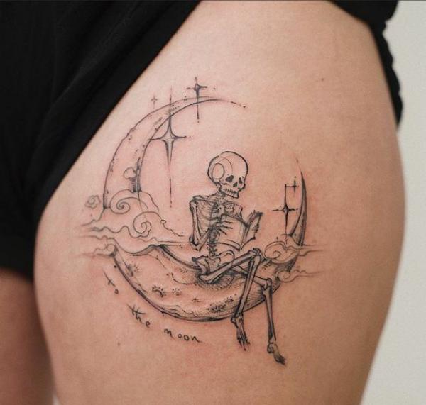 A skeleton sitting on crescent moon