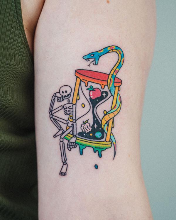 A stylized skeleton sitting on a colored hourglass with a snake