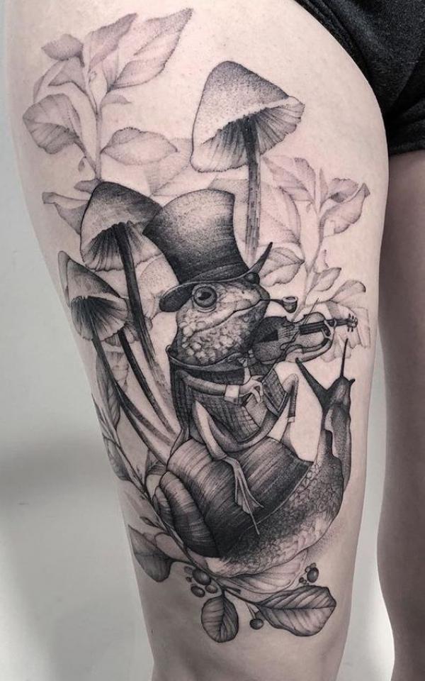Black and grey frog playing violin