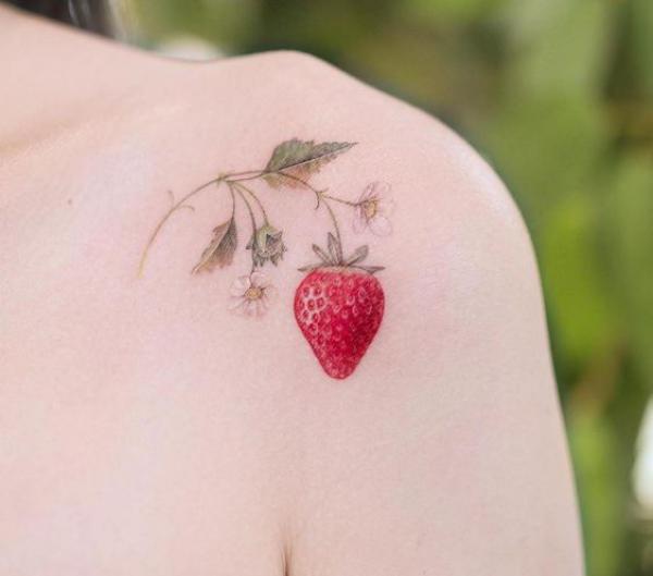 Cute strawberry shoulder tattoo