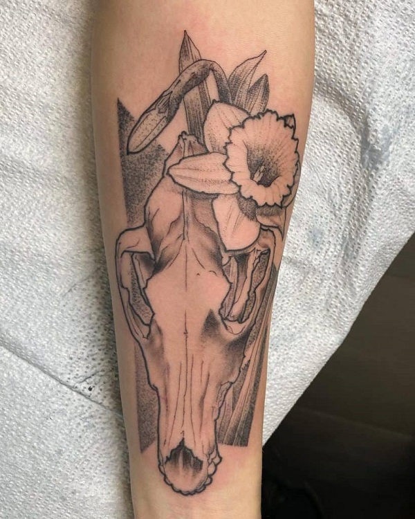 Daffodil and bull skull tattoo