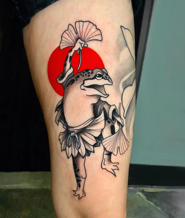 Dancing frog thigh tattoo