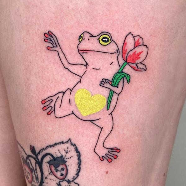 Dancing frog with flower