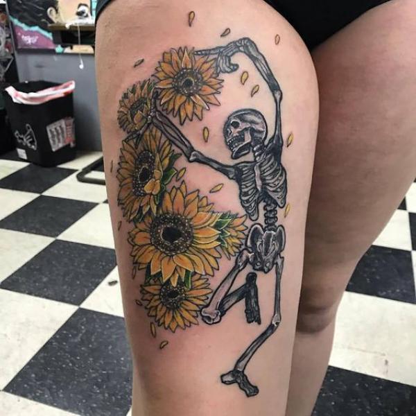 Dancing skeleton with sunflower