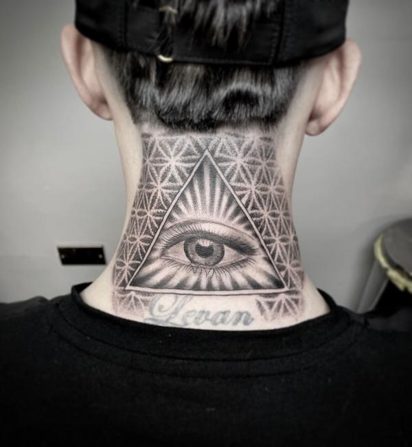 Eye of Providence on flower of life backdrop