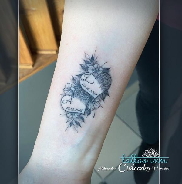 Fingerprint heart tattoo with initials and dates