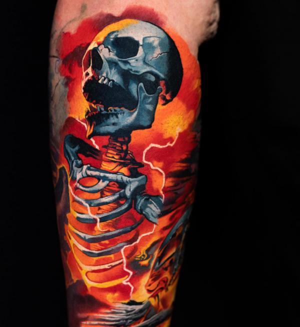 Flaming skeleton tattoo