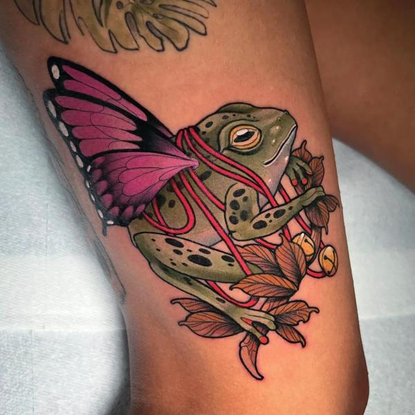 Frog and butterfly tattoo