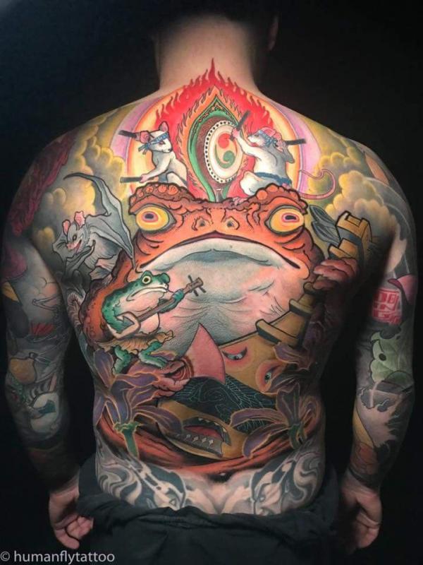Frog back tattoo