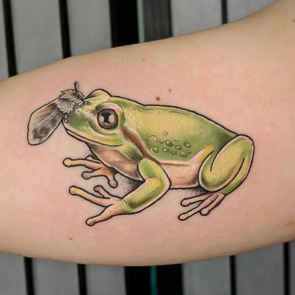 Frog bicep tattoo