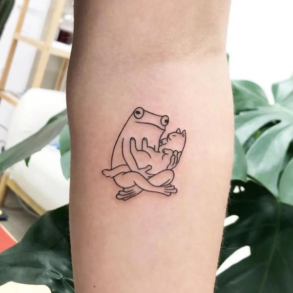 Frog outline tattoo