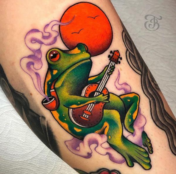 Frog playing guitar in the air