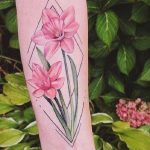 Geometric pink daffodil flowers tattoo