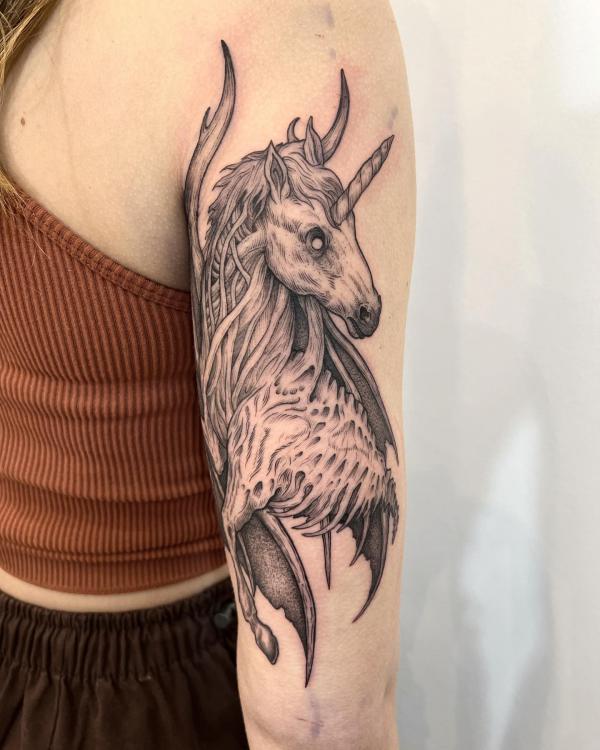 Gothic unicorn skeleton tattoo