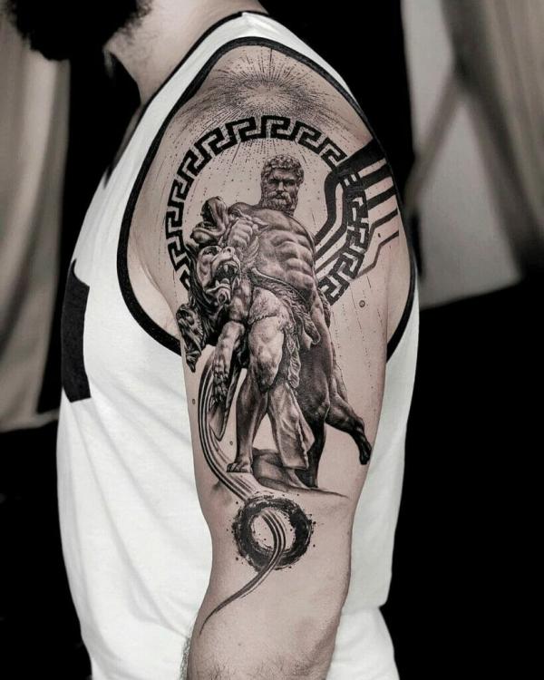 Greek Key ring and hades half sleeve tattoo