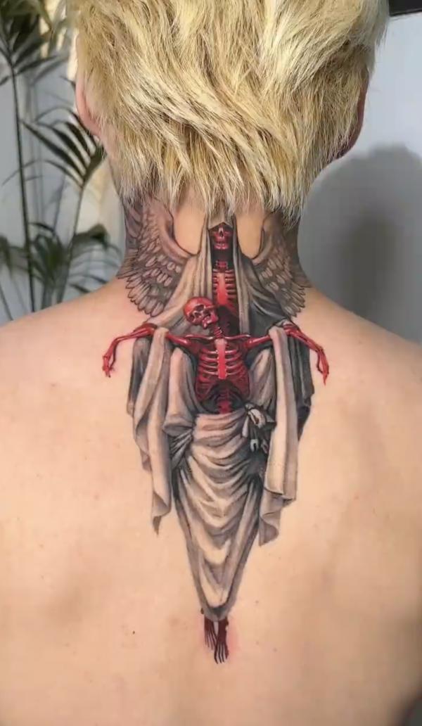 Grim reaper and a female sleleton