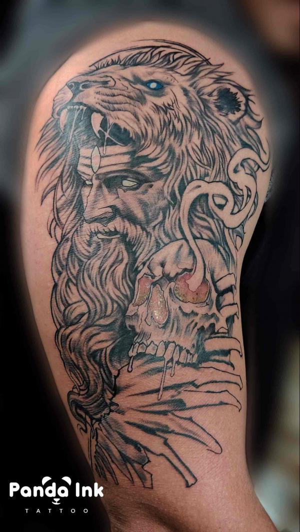 Hades with a wolf headdress and a skull