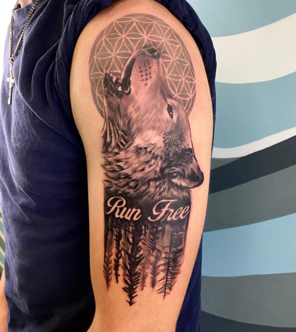 Howling wolf and flower of life