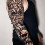 Jaguar and skull tattoo