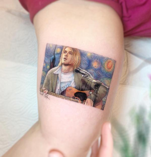 Kurt Cobain under starry night backdrop