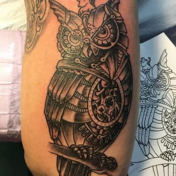 Mechanical owl tattoo