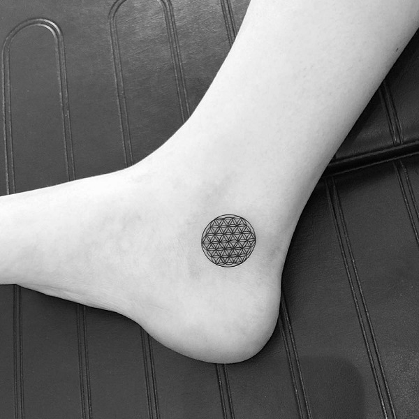 Minimalist Flower of Life ankle tattoo
