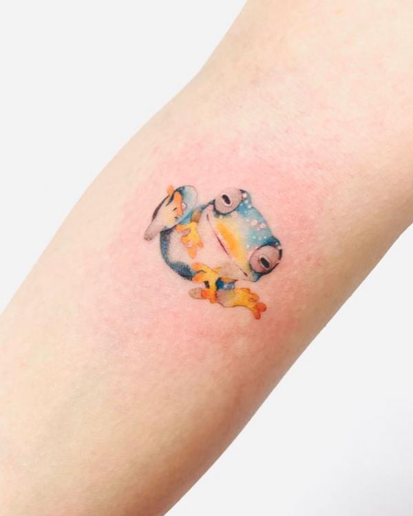 Minimalist frog tattoo