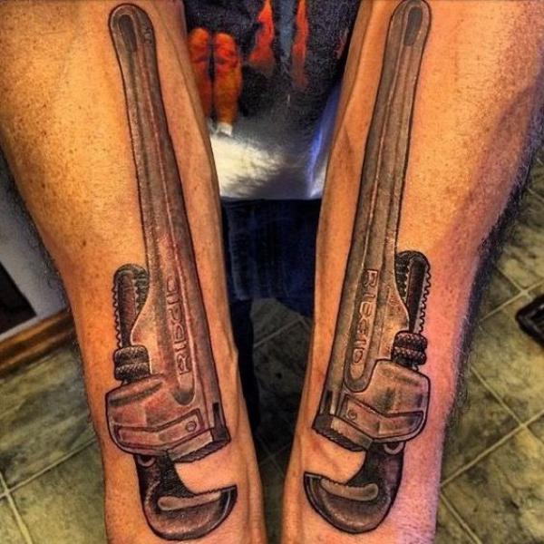 Pipe wrench forearm tattoo