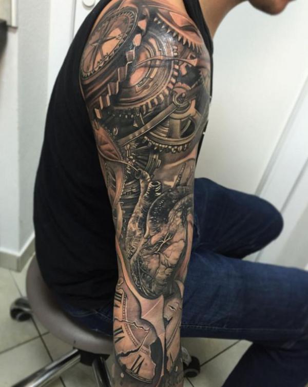 Realistic mechanics and human heart full sleeve tattoo