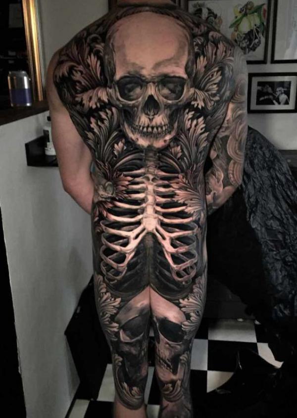 Realistic skeleton and skull full back tattoo