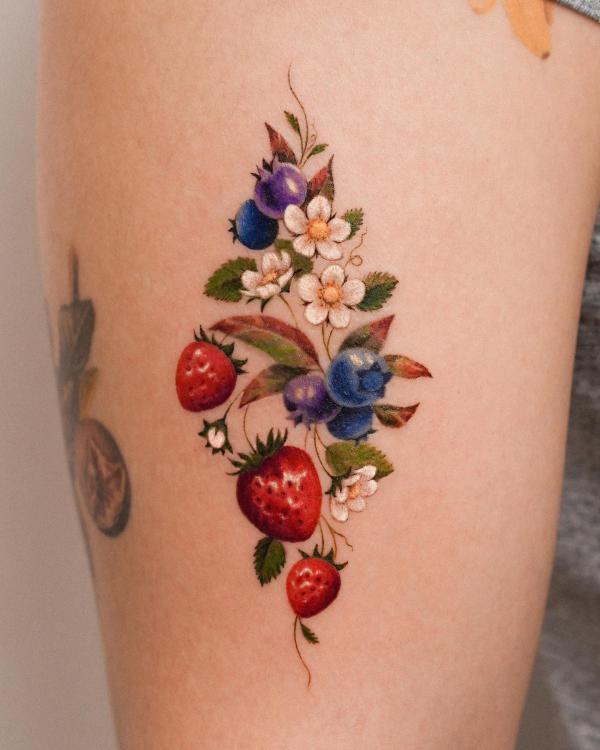 Sketch work blackberries tattoo on the forearm.
