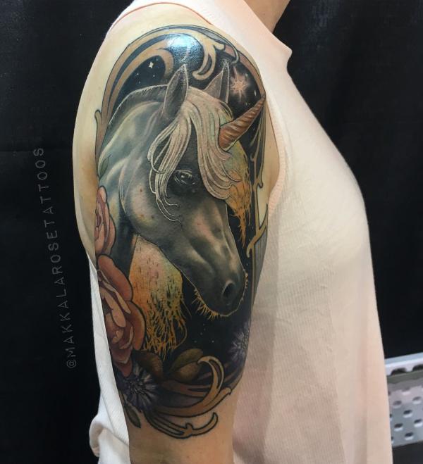 Realistic unicorn head tattoo