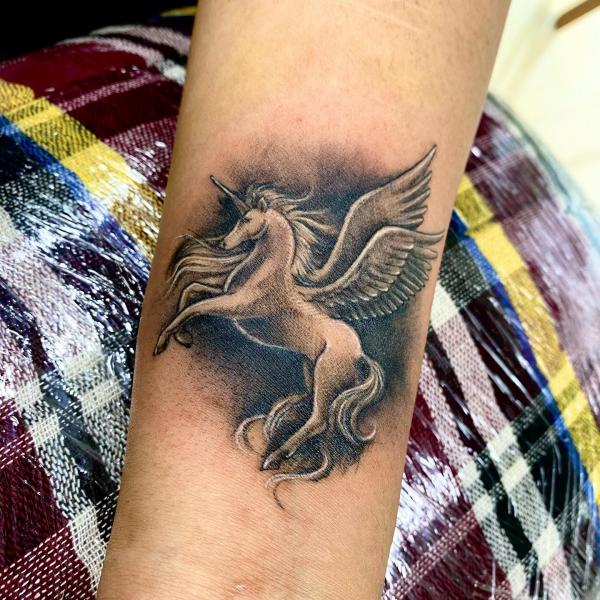 Realistic unicorn with wings