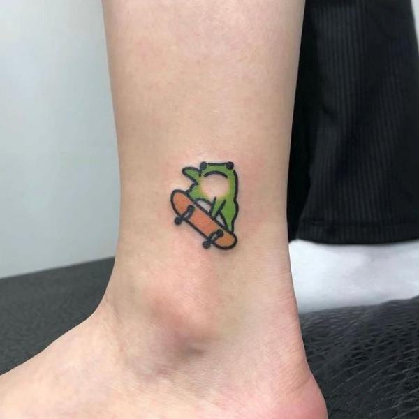 Simple frog ankle tattoo