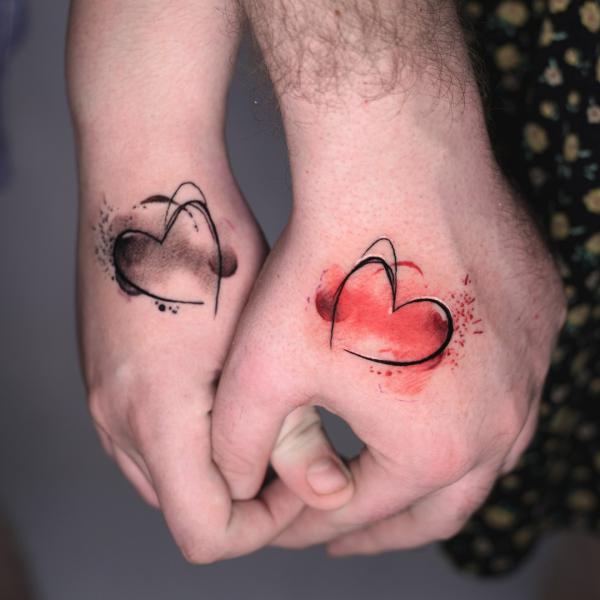 Simple heart matching tattoo