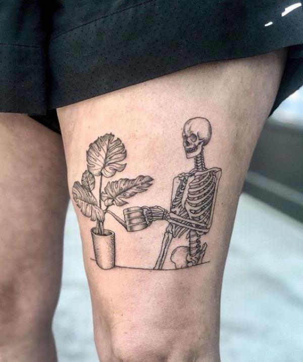 Skeleton watering plants
