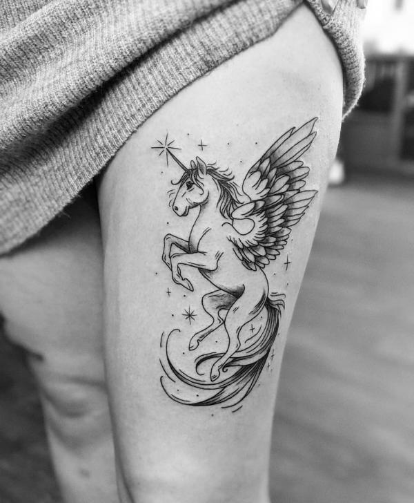Sketchy unicorn tattoo