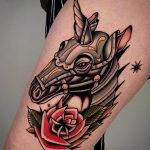 Traditional unicorn and rose tattoo