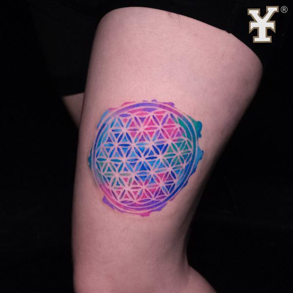 Watercolor flower of life tattoo