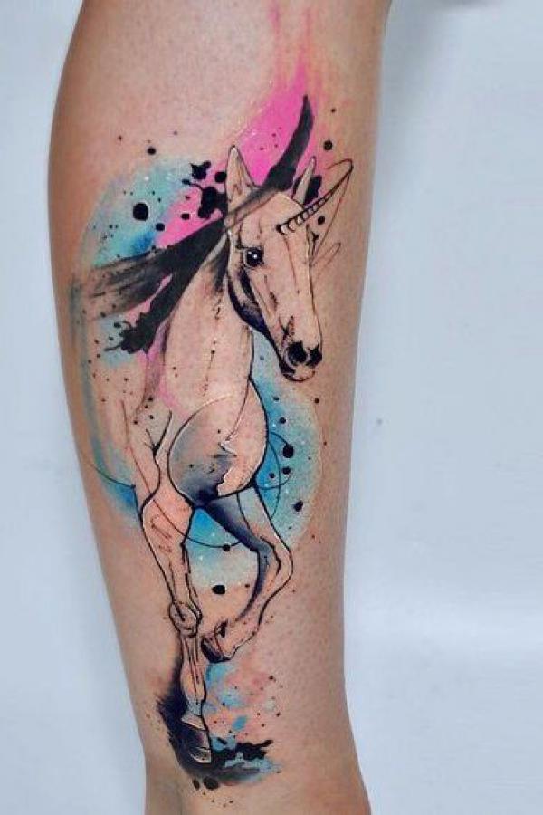 Watercolor unicorn tattoo