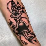 A dagger pierced a heart symbol