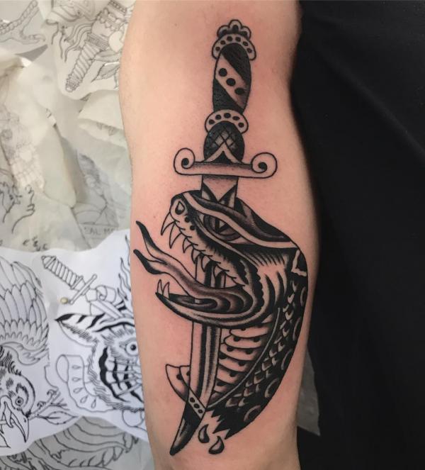 A dagger pierced snake