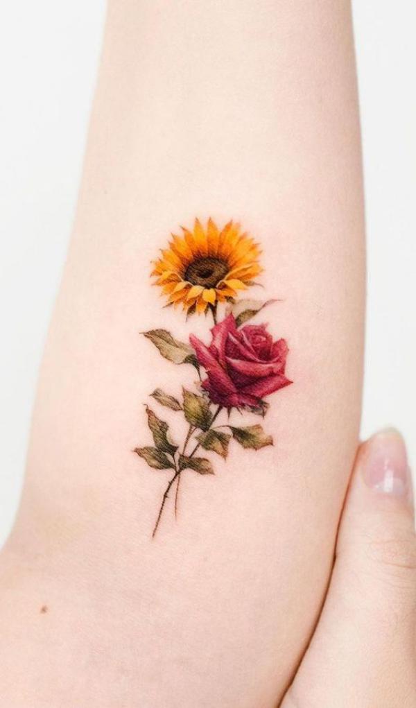 A stem of sunflower and rose tattoo