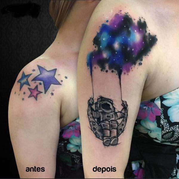 Astronaut and galaxy cover up tattoo
