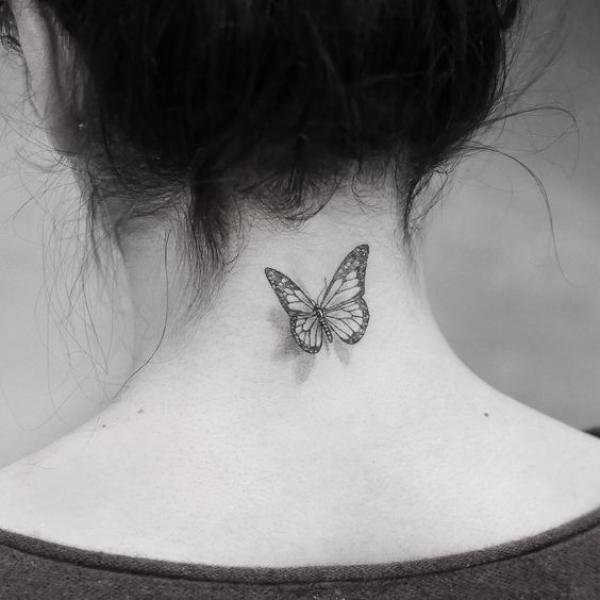 Black and grey 3D butterfly back neck tattoo 1