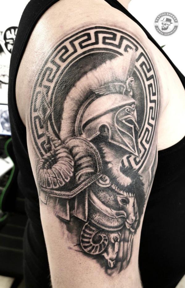 Black and grey Ares sleeve tattoo