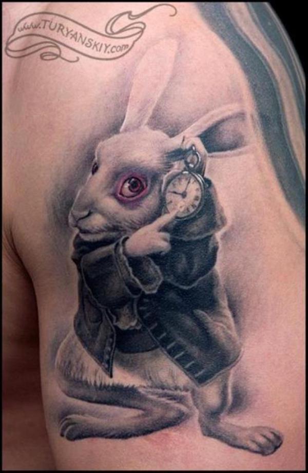 Black and grey rabbit with clock tattoo