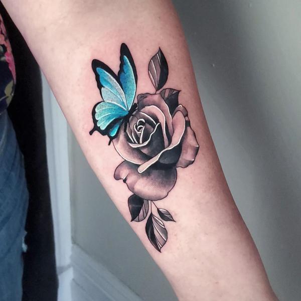 Black and grey rose with blue butterfly
