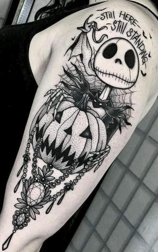 Black and white Jack Skellington and pumpkin tattoo sleeve