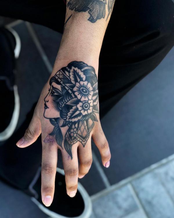 Black old school woman face tattoo